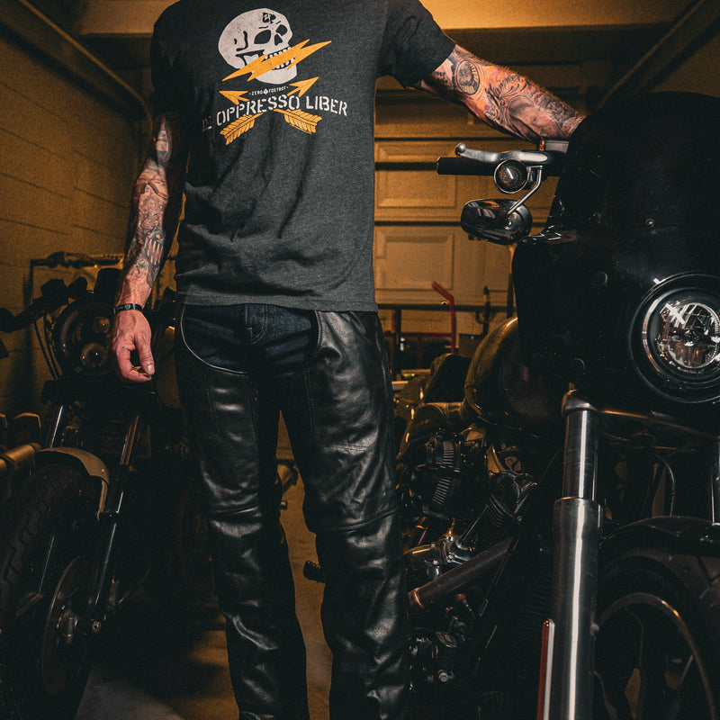 Unik Premium leather chaps designed for durability and style. With reinforced stitching, silver hardware, and an adjustable fit, these chaps are ideal for bikers