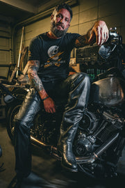 Unik Premium leather chaps designed for durability and style. With reinforced stitching, silver hardware, and an adjustable fit, these chaps are ideal for bikers