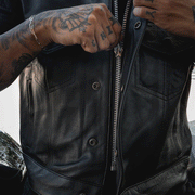  Made from cowhide leather, it includes four exterior pockets, two inside concealed carry pockets, a zip snap main closure, antique brass hardware, and a one-panel back, offering both style and functionality for various settings.