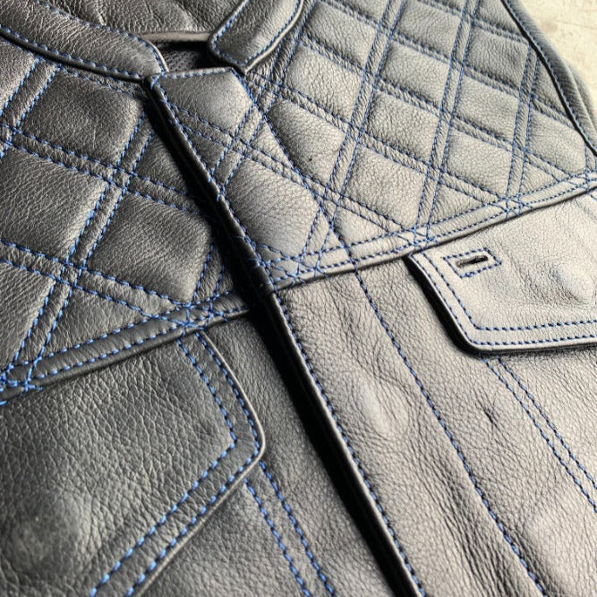The Men's Diamond Stitch Club Vest by Unik Premium combines sophisticated design with practical features.