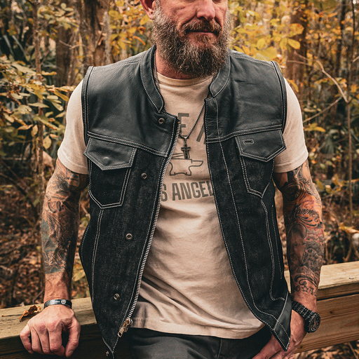  Featuring four exterior pockets, two inside concealed carry pockets, a zip snap main closure, antique brass hardware, and a one-panel back, this vest provides both practicality and unique aesthetic appeal.