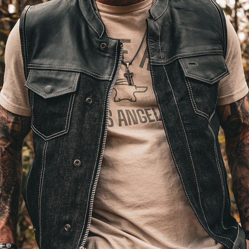  Featuring four exterior pockets, two inside concealed carry pockets, a zip snap main closure, antique brass hardware, and a one-panel back, this vest provides both practicality and unique aesthetic appeal.