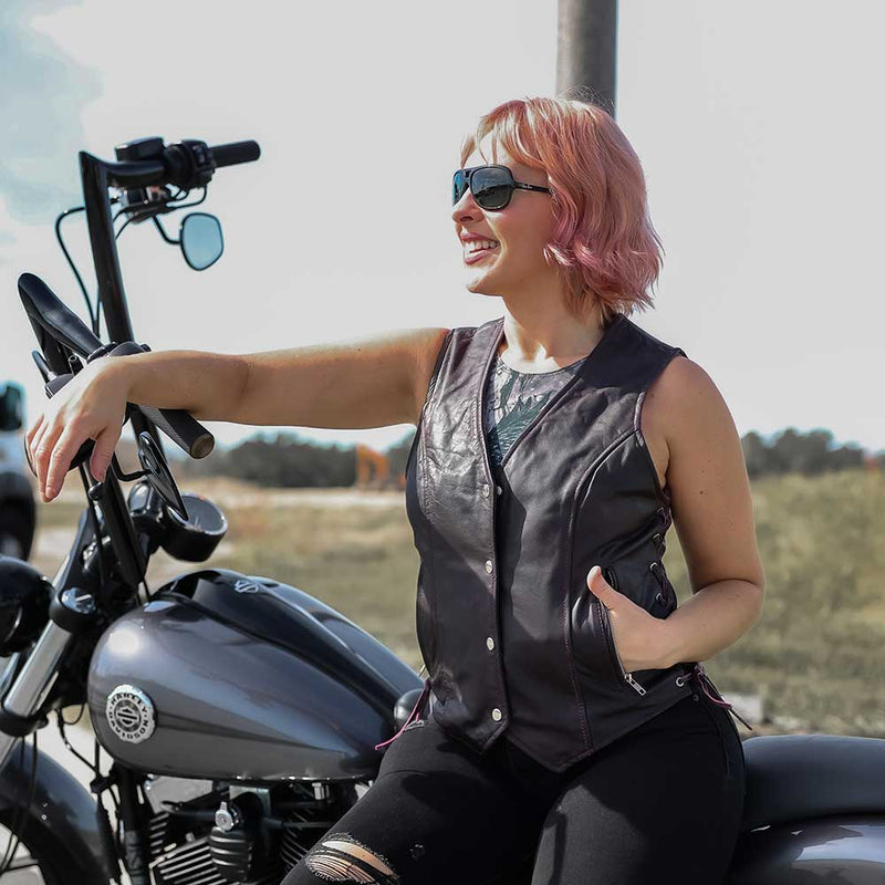 Style # 6897.17 epitomizes timeless elegance and functionality with a ladies' premium traditional vest crafted from luxurious lambskin leather