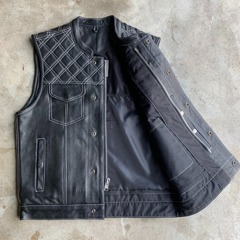 The Men's Diamond Stitch Club Vest by Unik Premium combines sophisticated design with practical features. Made from cowhide leather with a diamond stitch pattern.