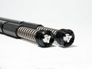 Two RWD V-Twin motorcycle fork cartridges with exposed springs and black adjustable caps, featuring the RWD logo, on a white background.
